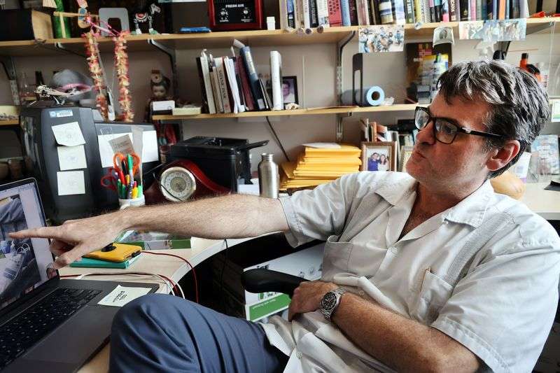 Brigham Young University professor Eric Eliason sits in
his office in the Joseph F. Smith Building in Provo on Friday,
Sept. 10, 2021. Eliason, who served as a National Guard chaplain in
Afghanistan, is working to evacuate the family of a former
associate.