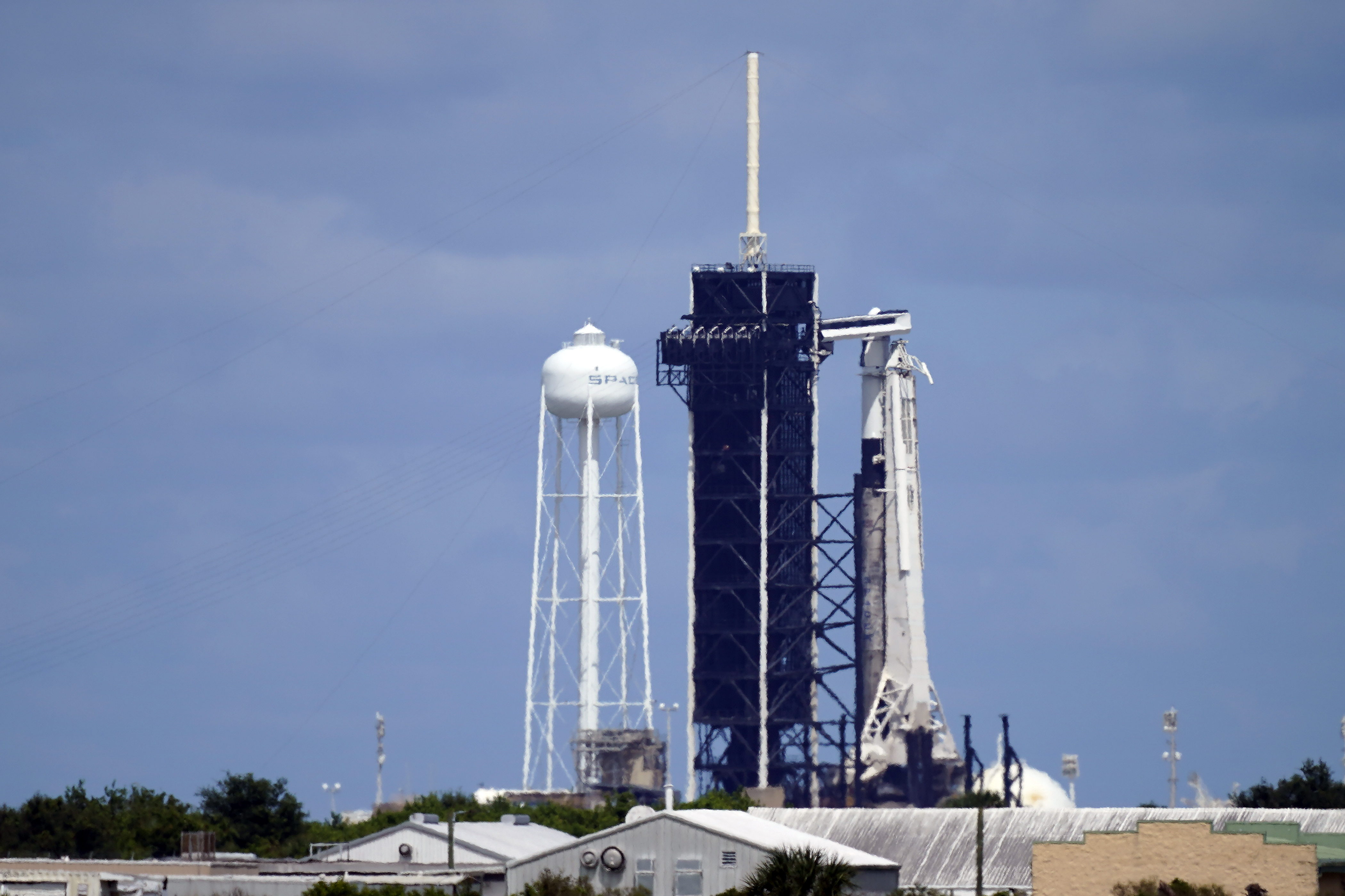 A SpaceX Falcon 9 rocket sits on Kennedy Space Center's Launch Pad 39-A Tuesday in Cape Canaveral, Fla. For the first time in 60 years of human spaceflight, a rocket is poised to blast into orbit with no professional astronauts on board, only four tourists.