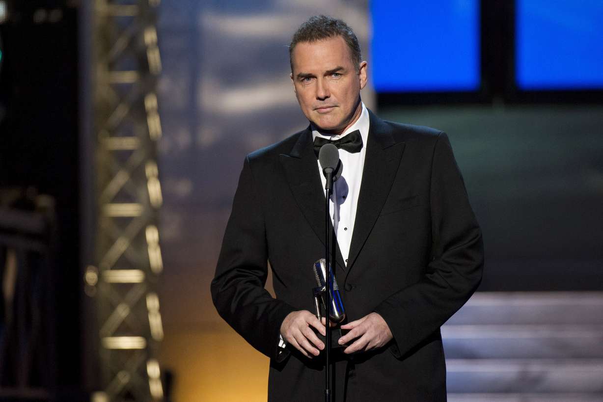 Comedian-actor Norm Macdonald appears onstage at The 2012 Comedy Awards in New York on April 28, 2012. Macdonald, a comedian and former cast member on "Saturday Night Live," died Tuesday, Sept. 14, 2021, after a nine-year battle with cancer that he kept private.