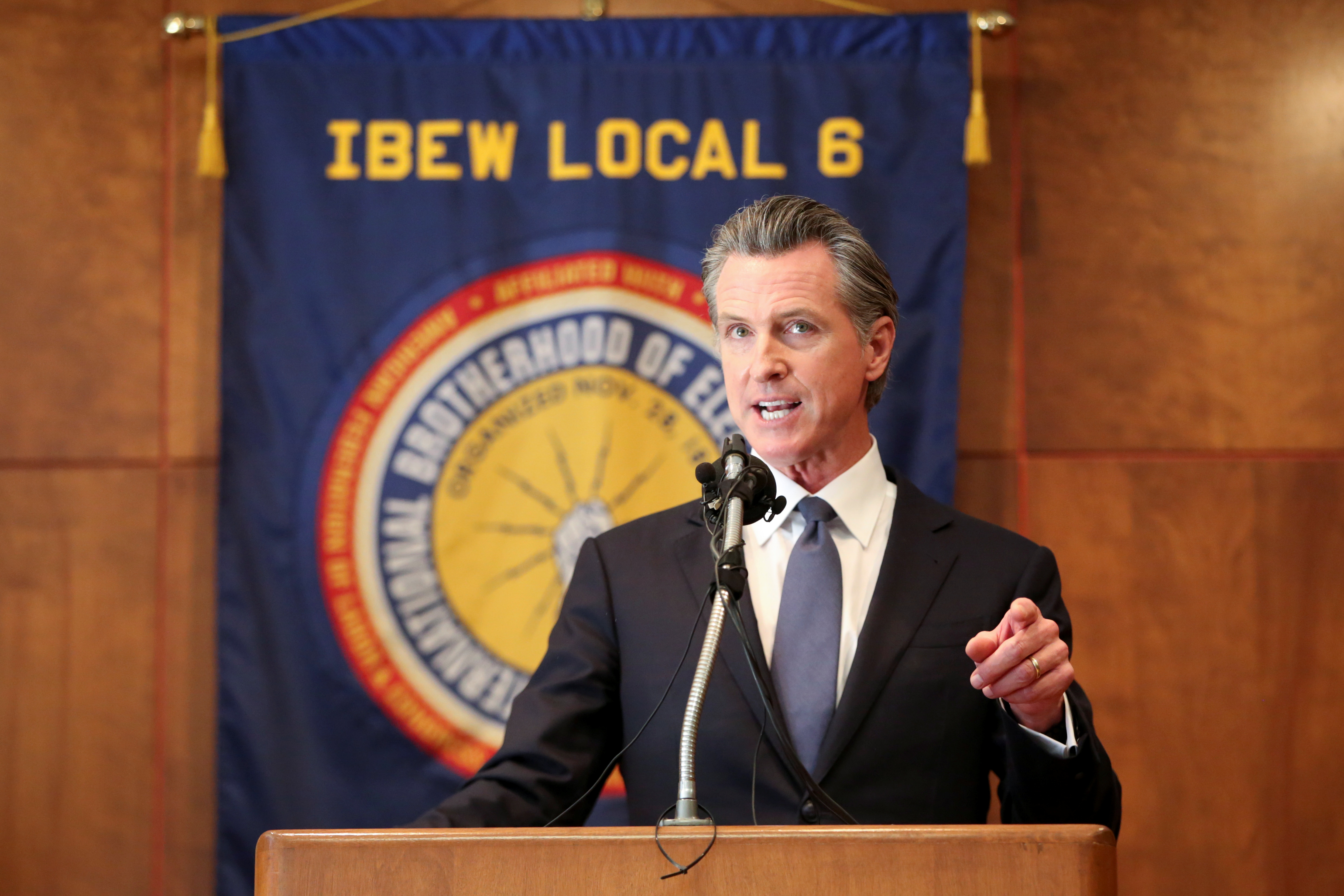 California Gov. Gavin Newsom speaks during a campaign rally in San Francisco on Tuesday. TV networks projected Tuesday that Newsom has defeated a recall effort.