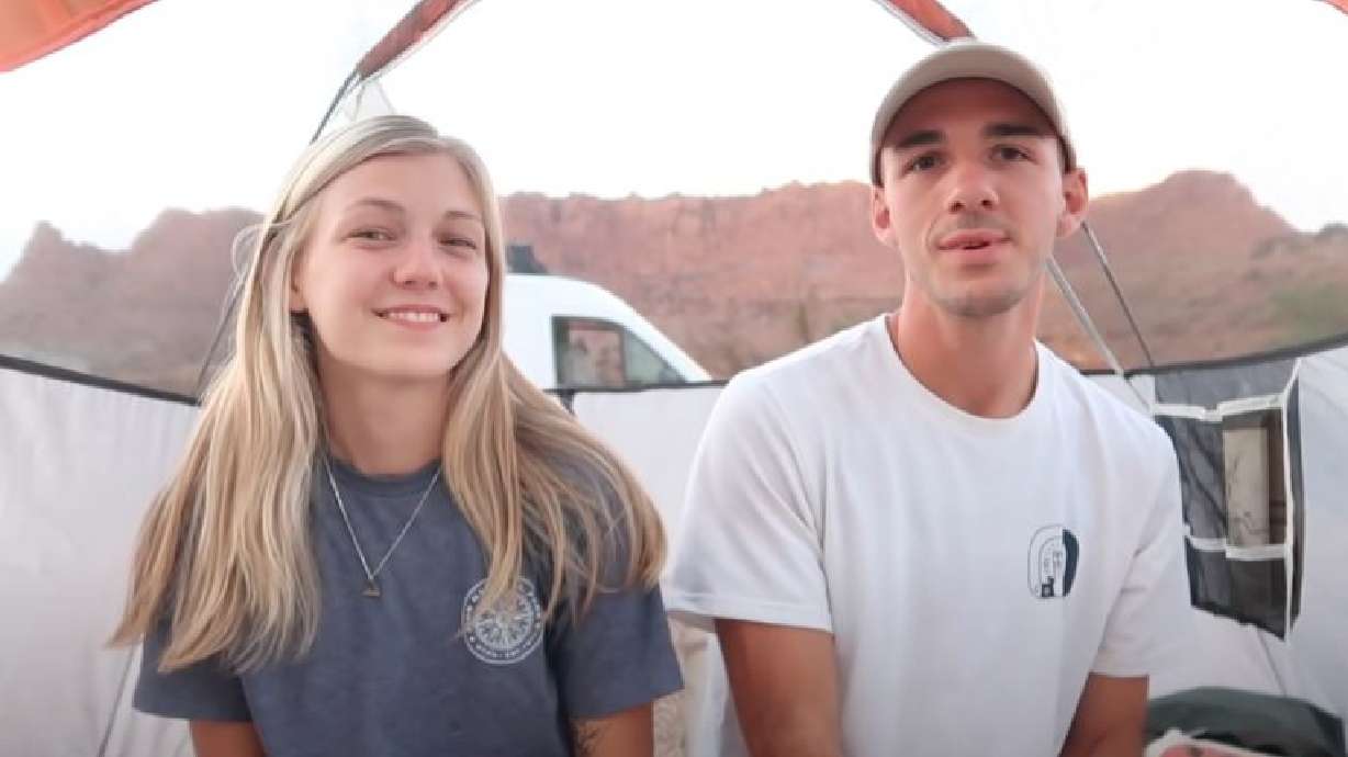 Gabby Petito and Brian Laundrie, as seen in a video posted to their YouTube channel. This is a screen grab of them speaking about their trip to Utah. The FBI is searching the home of Laundrie on Monday on a court-authorized warrant the morning after searchers found a body matching the description of his girlfriend Petito in Wyoming.
