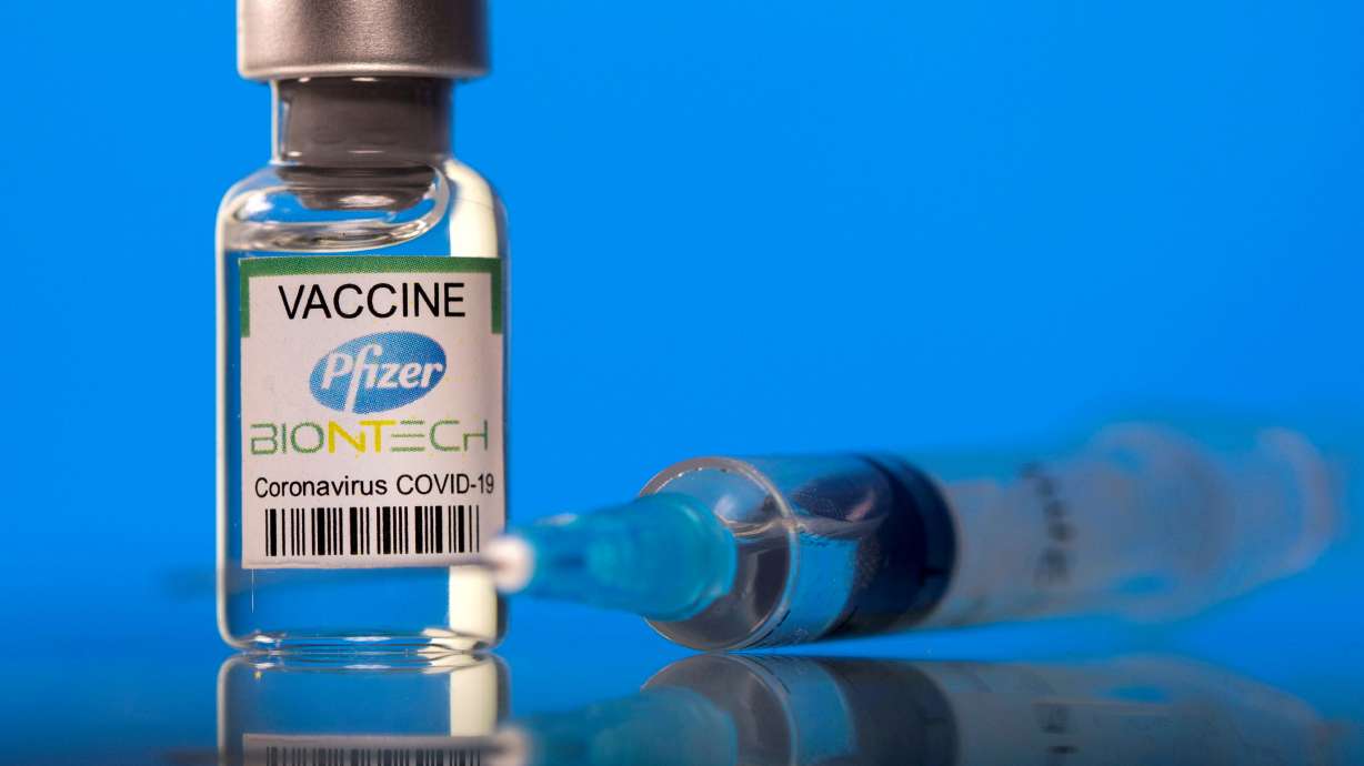 A vial labelled with the Pfizer-BioNTech coronavirus vaccine is seen in this illustration March 19. Pfizer said Monday its COVID-19 vaccine works for children ages 5 to 11.