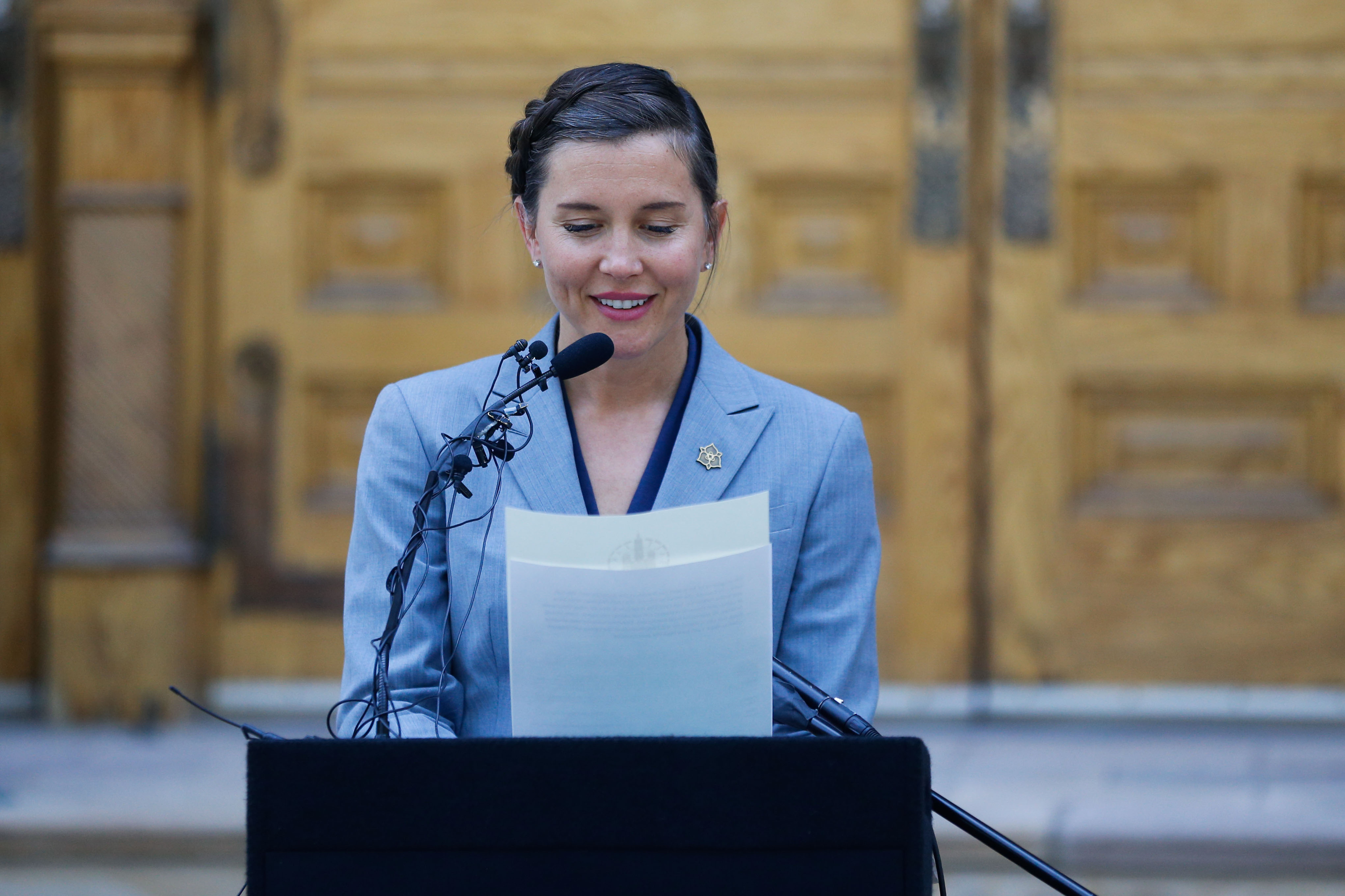 Salt Lake City Mayor Erin Mendenhall reads a proclamation at the Salt Lake City-County Building during a celebration to mark the beginning of Hispanic Heritage Month on Wednesday.
