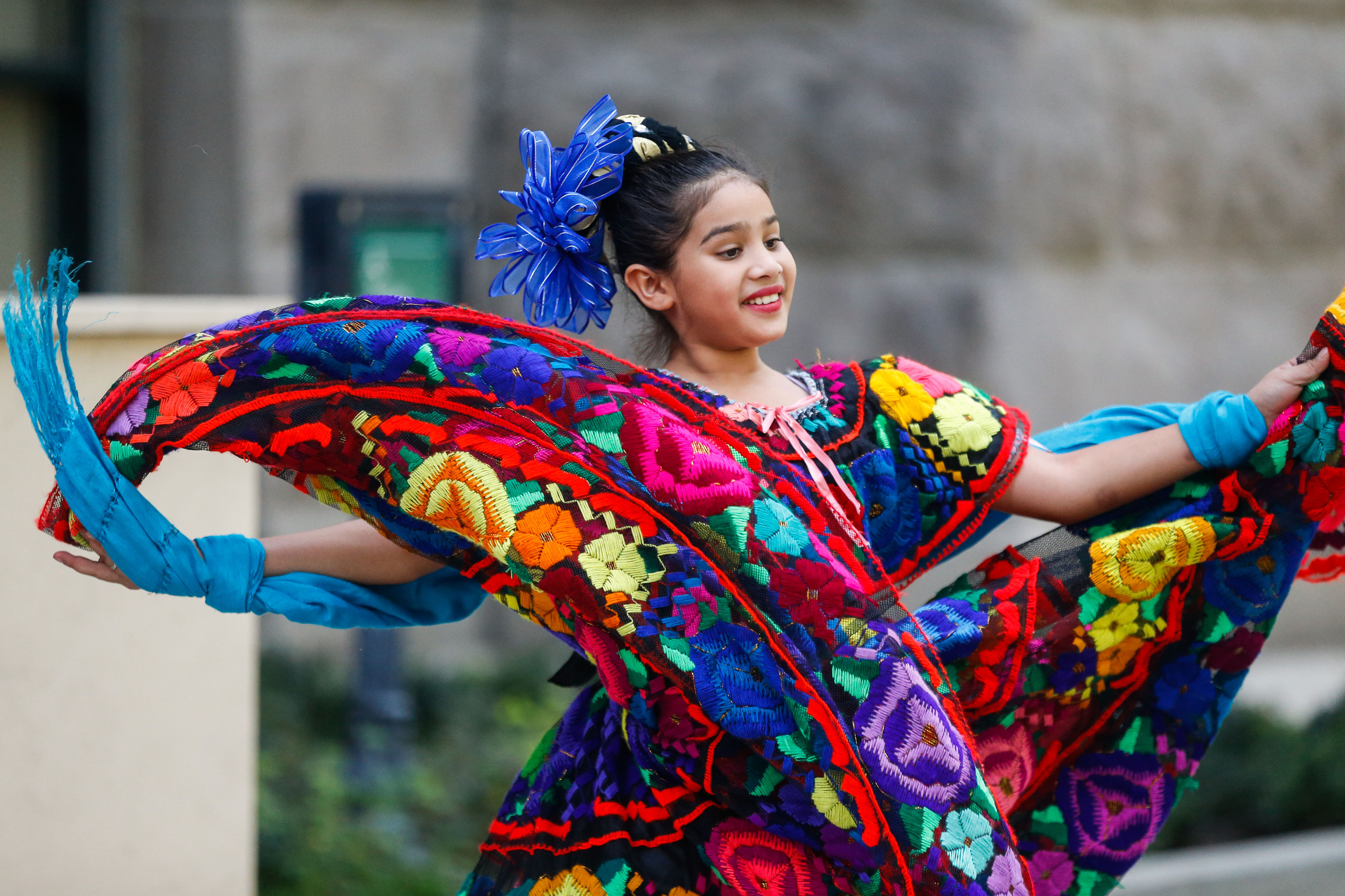 Mili Silos, 11, performs a traditional ballet folklorico at the Salt Lake City-County Building during a celebration to mark the beginning of Hispanic Heritage Month on Wednesday.