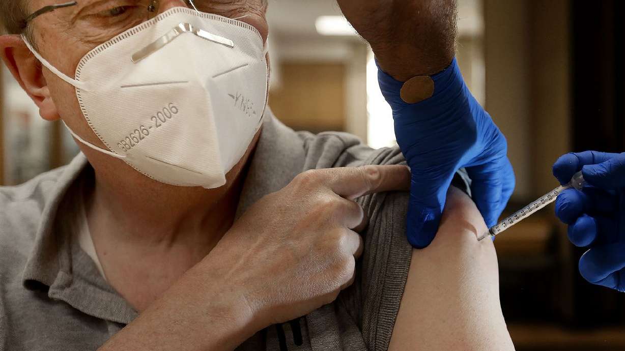 Bountiful resident Blaine Gardner, who is immunocompromised, gets a third COVID-19 vaccination at the South
Davis Senior Activity Center in Bountiful on Aug. 25.
