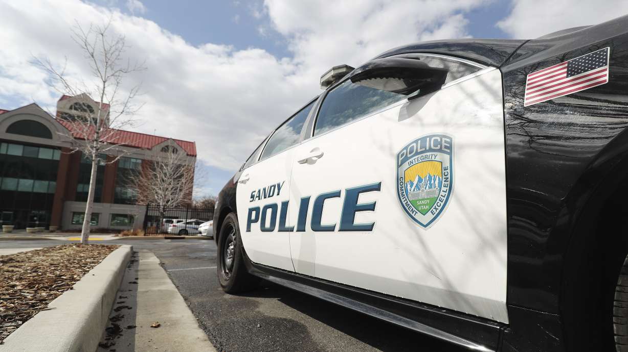 A 15-year-old boy was accidentally shot while he was sitting in the front passenger seat of a car by a 14-year-old boy who was in the back seat playing with a gun, according to Sandy police.