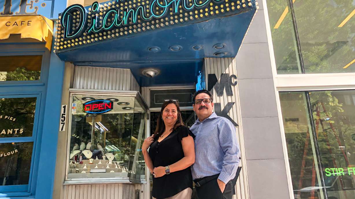 Sandra and Joe Andrade, owners of McKay Diamonds, pose outside of their store on Main Street on Wednesday. They are moving at the end of the month to a new location on Regent Street, still in downtown Salt Lake City.