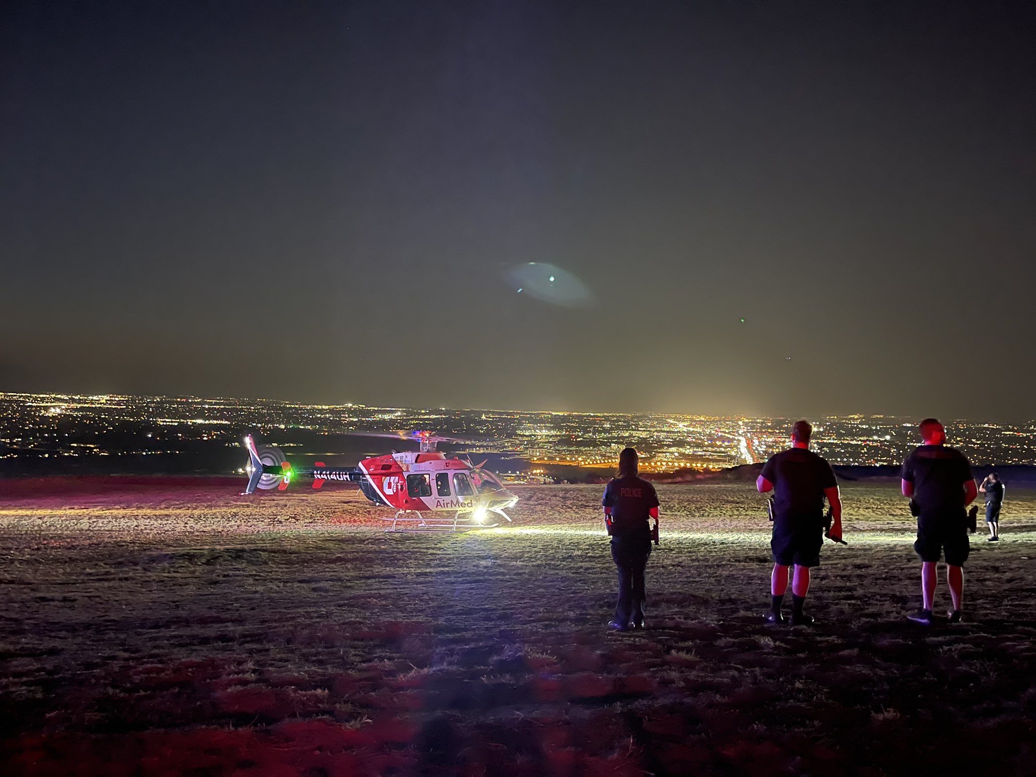 A University of Utah medical helicopter lands at the Point of the Mountain flight park in Draper on Thursday. A man died in a paraglider crash at the park, according to police. 