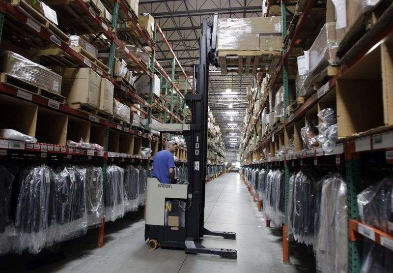 Overstock.Com employee Jeff Owens works at the
warehouse in West Valley City Aug. 23, 2011.