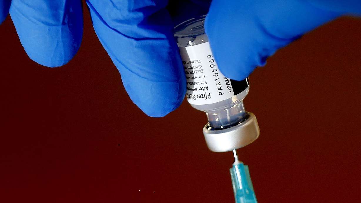 The Pfizer-BioNTech COVID-19 vaccine is drawn into a syringe in Bountiful on Aug. 25. Utah’s legislative leaders want Gov.
Spencer Cox to reject President Joe Biden’s proposed COVID-19 vaccine requirements for businesses and say they fully support the multistate legal effort to combat the "mandate.”