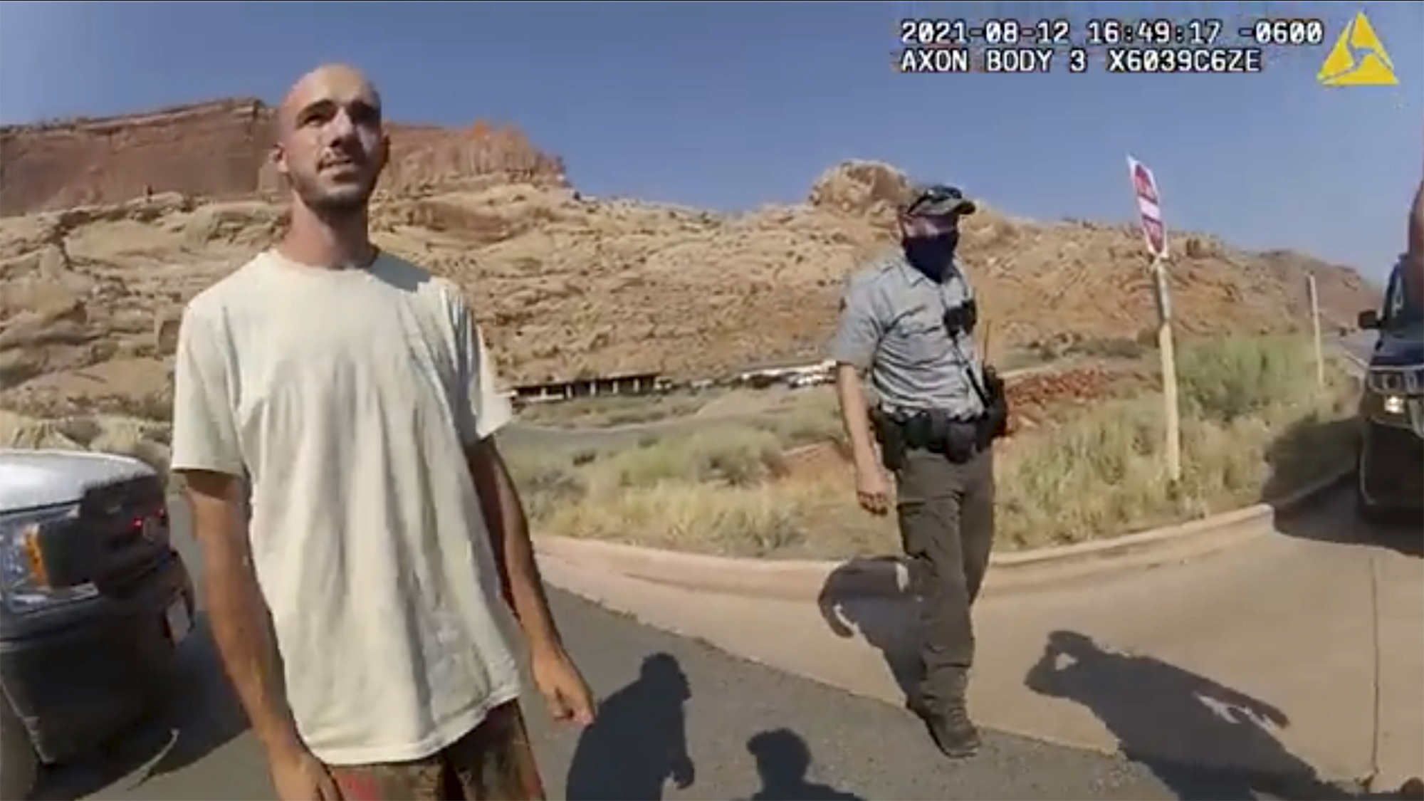 This police camera video provided by the Moab Police Department shows Brian Laundrie talking to a police officer after police pulled over the van he was traveling in with his girlfriend, Gabrielle “Gabby” Petito, near the entrance to Arches National Park on Aug. 12.
