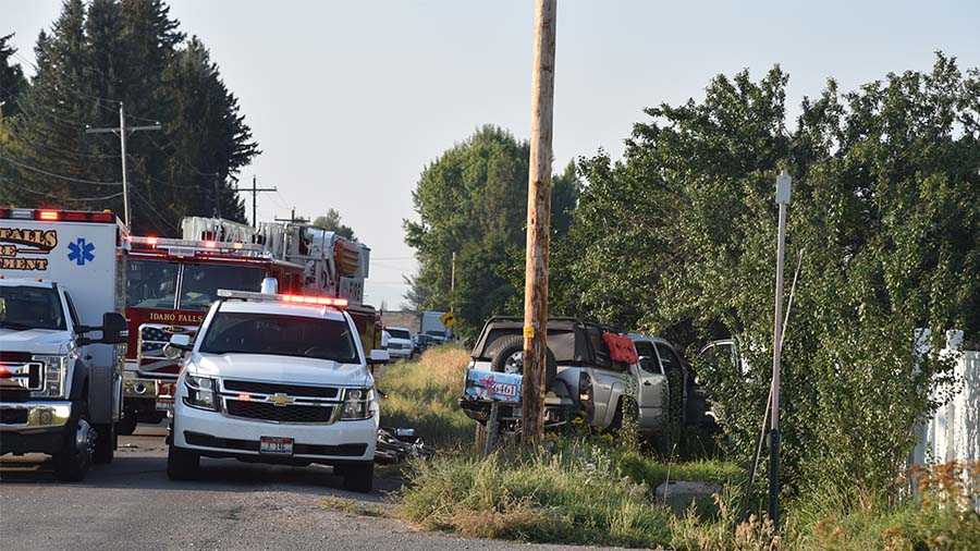 Police respond to a bus crash that killed the driver of a truck in Idaho Falls on Monday.