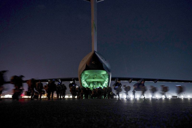 Soldiers, assigned to the 82nd Airborne Division,
prepare to board a U.S. Air Force C-17 Globemaster III aircraft at
Hamid Karzai International Airport in Kabul, Afghanistan, on Aug.
30.