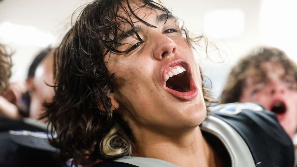 Stansbury quarterback Ezra Harris celebrates after winning a high school football game against Tooele at Stansbury High School in Stansbury Park on Friday, Sept. 17, 2021.