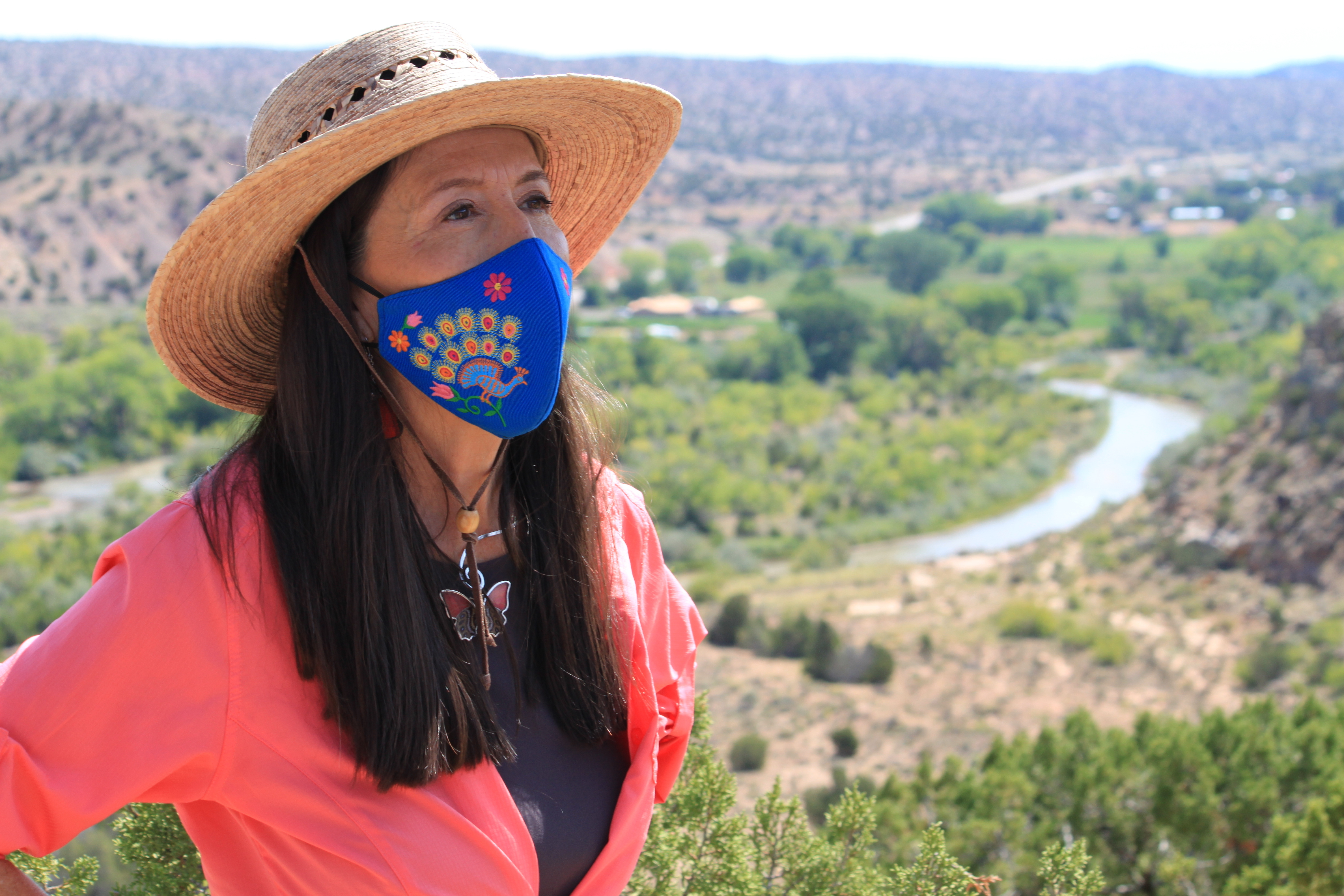 This Aug. 31 photo shows U.S. Rep. Teresa Leger Fernández during a tour of the Rio Chama valley near Abiquiu, New Mexico. Leger Fernández said the traditional irrigation systems known as acequias that supply small farms throughout the region with water hold a cultural and historic significance and need to be preserved.