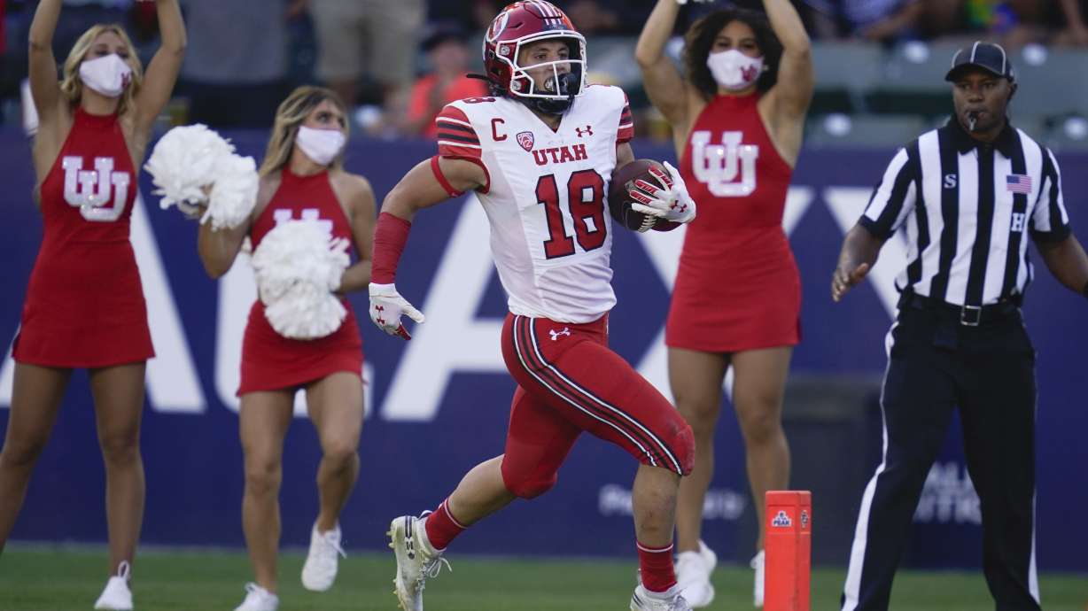 Utah wide receiver Britain Covey (18) runs to the end zone for a touchdown during the first half of an NCAA college football game against San Diego State Saturday, Sept. 18, 2021, in Carson, Calif