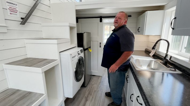 Bryce Chapman, a plumbing instructor at Davis Technical College said about 50 high school students helped build what they call the mighty tiny home.