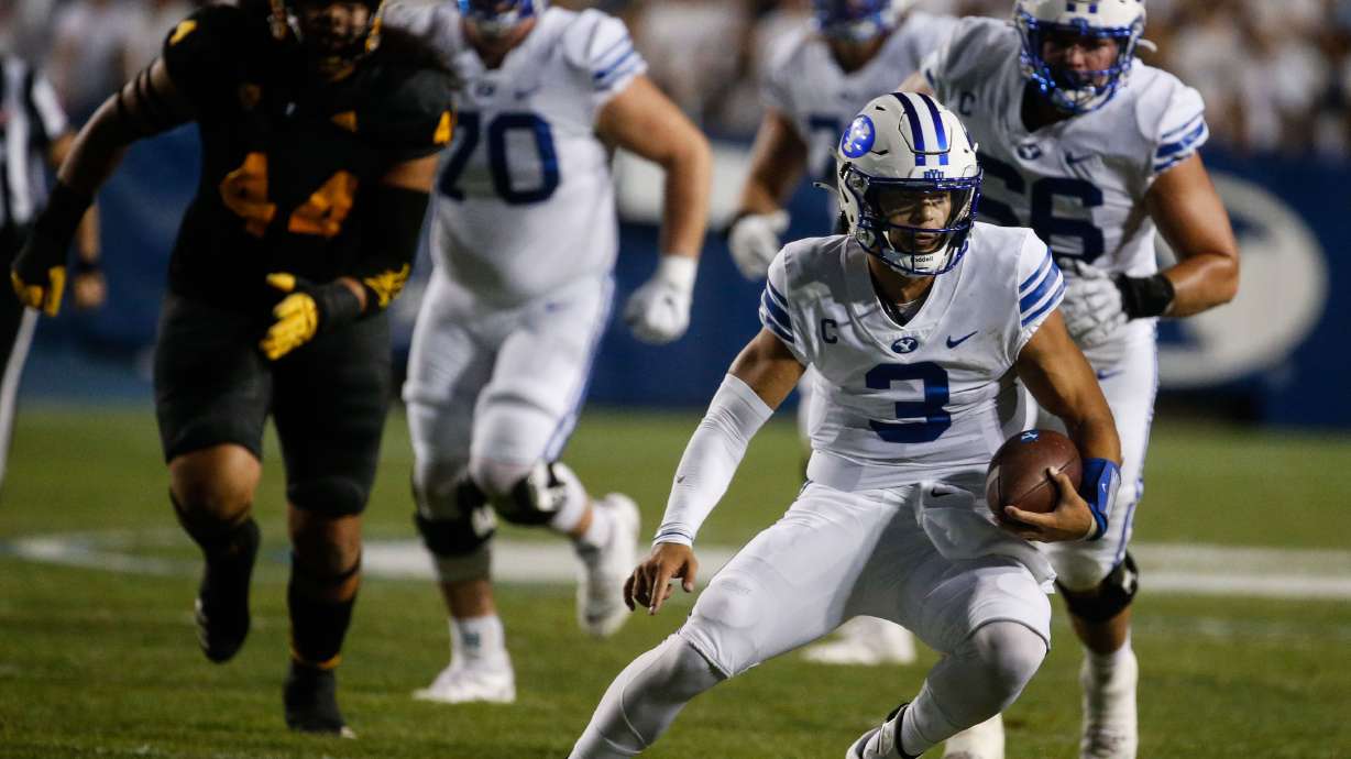 Brigham Young quarterback Jaren Hall (3) runs with the ball during an NCAA college football game against Arizona State at LaVell Edwards Stadium in Provo on Saturday, Sept. 18, 2021.