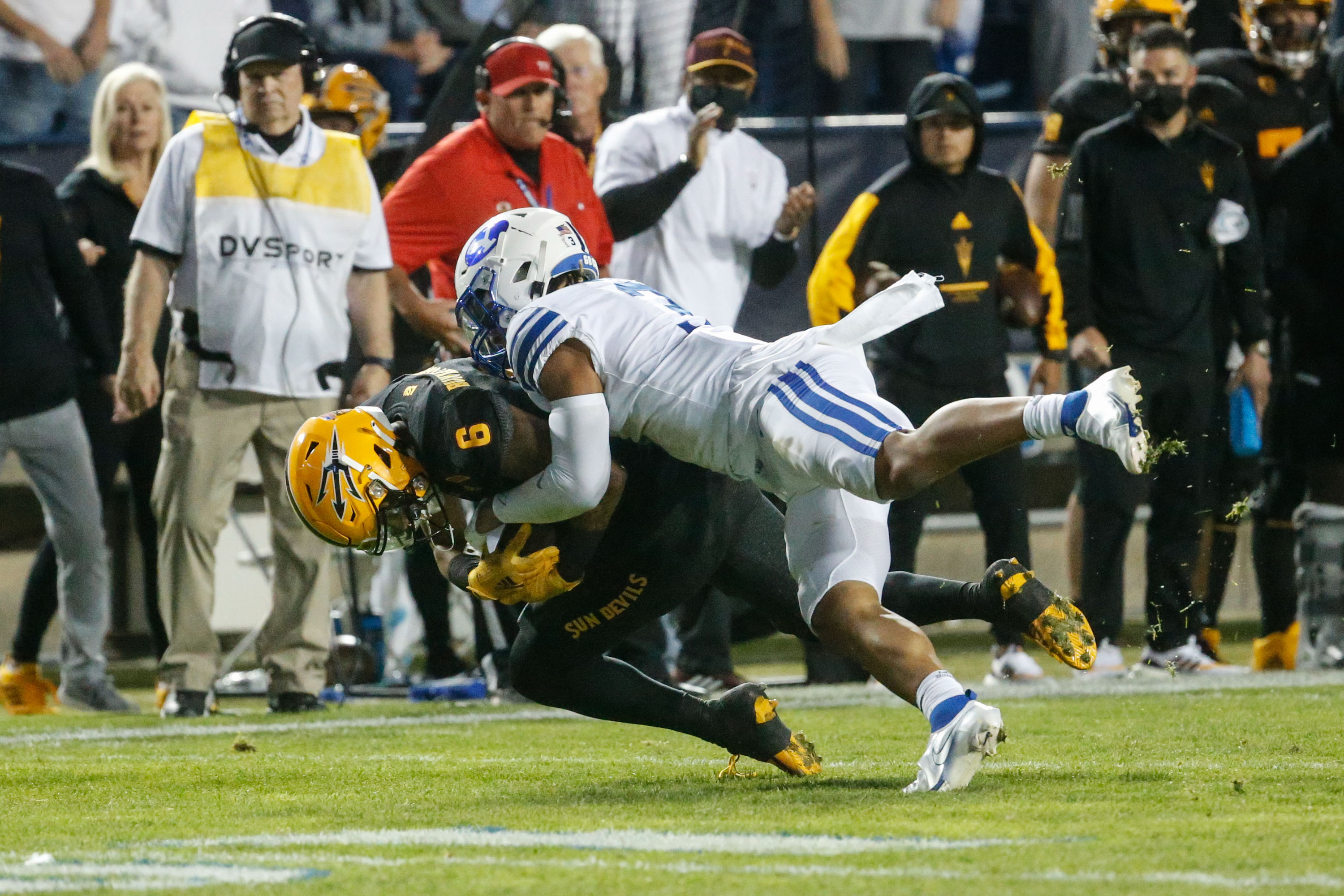 Arizona State wide receiver LV Bunkley-Shelton (6) gets tackled by Brigham Young defensive back Chaz Ah You during an NCAA college football game at LaVell Edwards Stadium in Provo on Saturday, Sept. 18, 2021.