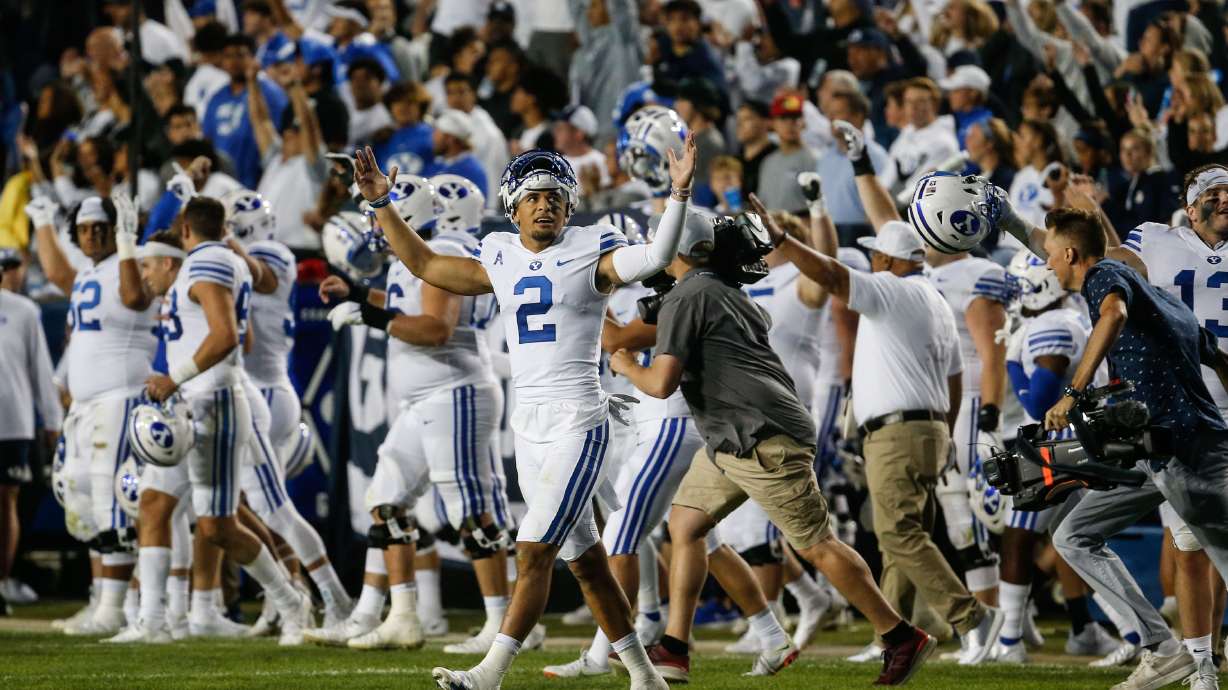 BYU players celebrate after winning against Arizona State during an NCAA college football game at LaVell Edwards Stadium in Provo on Saturday, Sept. 18, 2021.