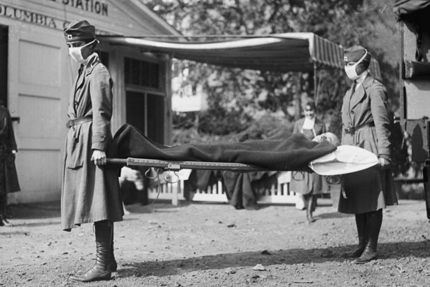 This photo made available by the Library of Congress shows a demonstration at the Red Cross Emergency Ambulance Station in Washington during the influenza pandemic of 1918. Historians think the pandemic started in Kansas in early 1918, and by winter 1919 the virus had infected a third of the global population and killed at least 50 million people, including 675,000 Americans. Some estimates put the toll as high as 100 million.