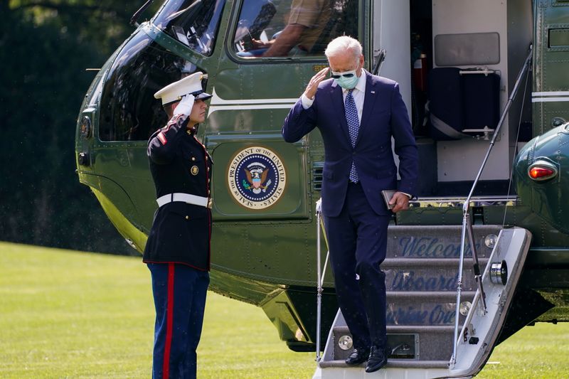 President Joe Biden disembarks from Marine One as he returns from Rehoboth Beach, Delaware, on the South Lawn at the White House in Washington, on Monday.