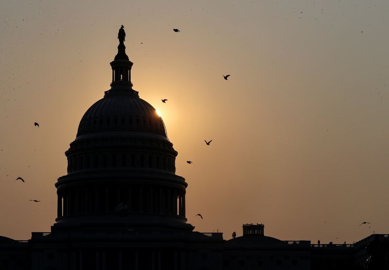 Democrats in the House of Representatives passed a bill on Tuesday to fund the U.S. government through Dec. 3 and suspend the nation's borrowing limit until the end of 2022, sending it to the Senate where Republicans have vowed to block it.