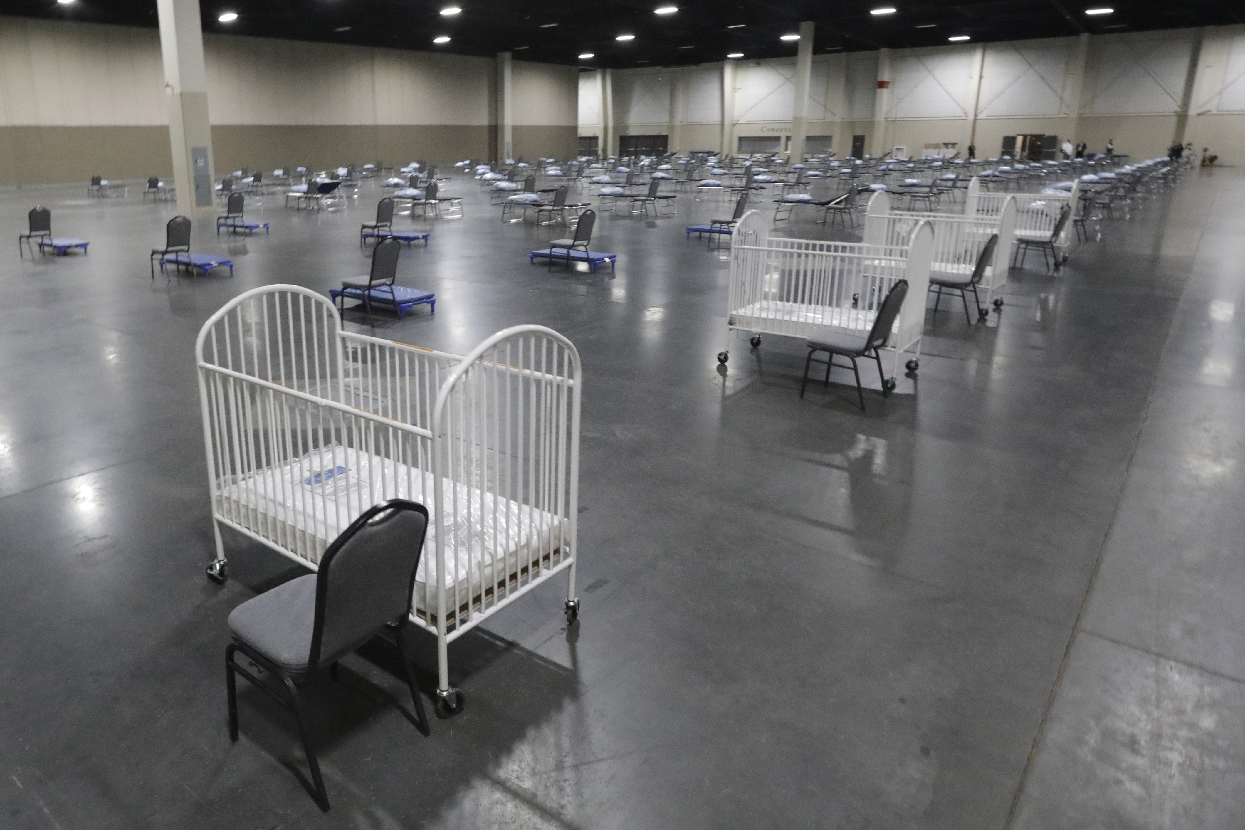 Cots and cribs are arranged at the Mountain America Expo Center in Sandy as an alternate care site or for hospital overflow amid the COVID-19 pandemic in April 2020. Although there has been a decline in births in the U.S. during the pandemic, a new report released Tuesday suggests the drop may have turned a corner as births started rebounding last March.