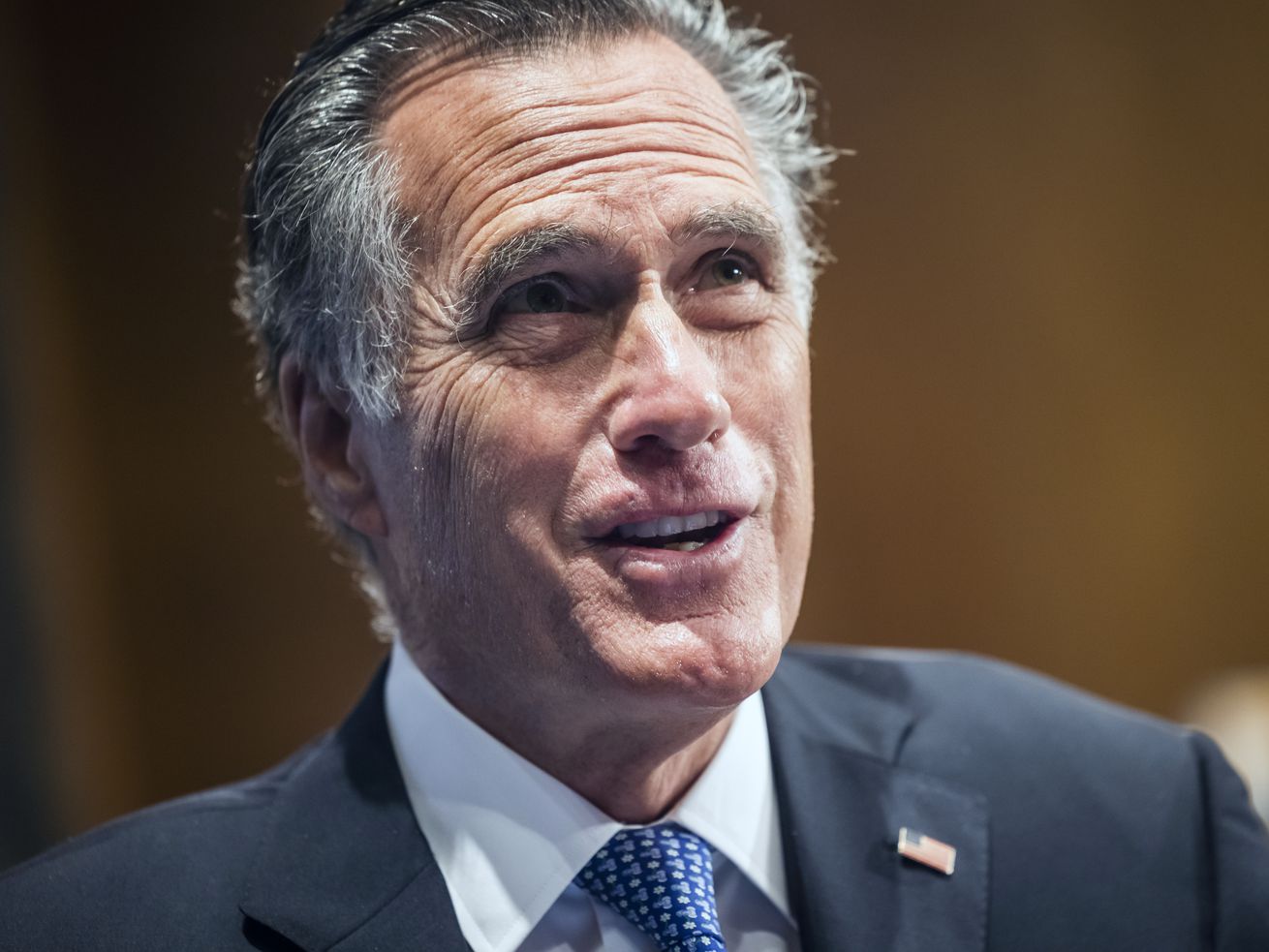 Sen. Mitt Romney questions FBI Director Christopher Wray during a Senate Homeland Security and Governmental
Affairs Committee hearing on Tuesday on Capitol Hill in Washington. Romney called the Biden administration’s immigration policy a "monumental disaster,” and said that would be enough to leave the federal government "hanging on by a thread”
were there not so many other disasters.