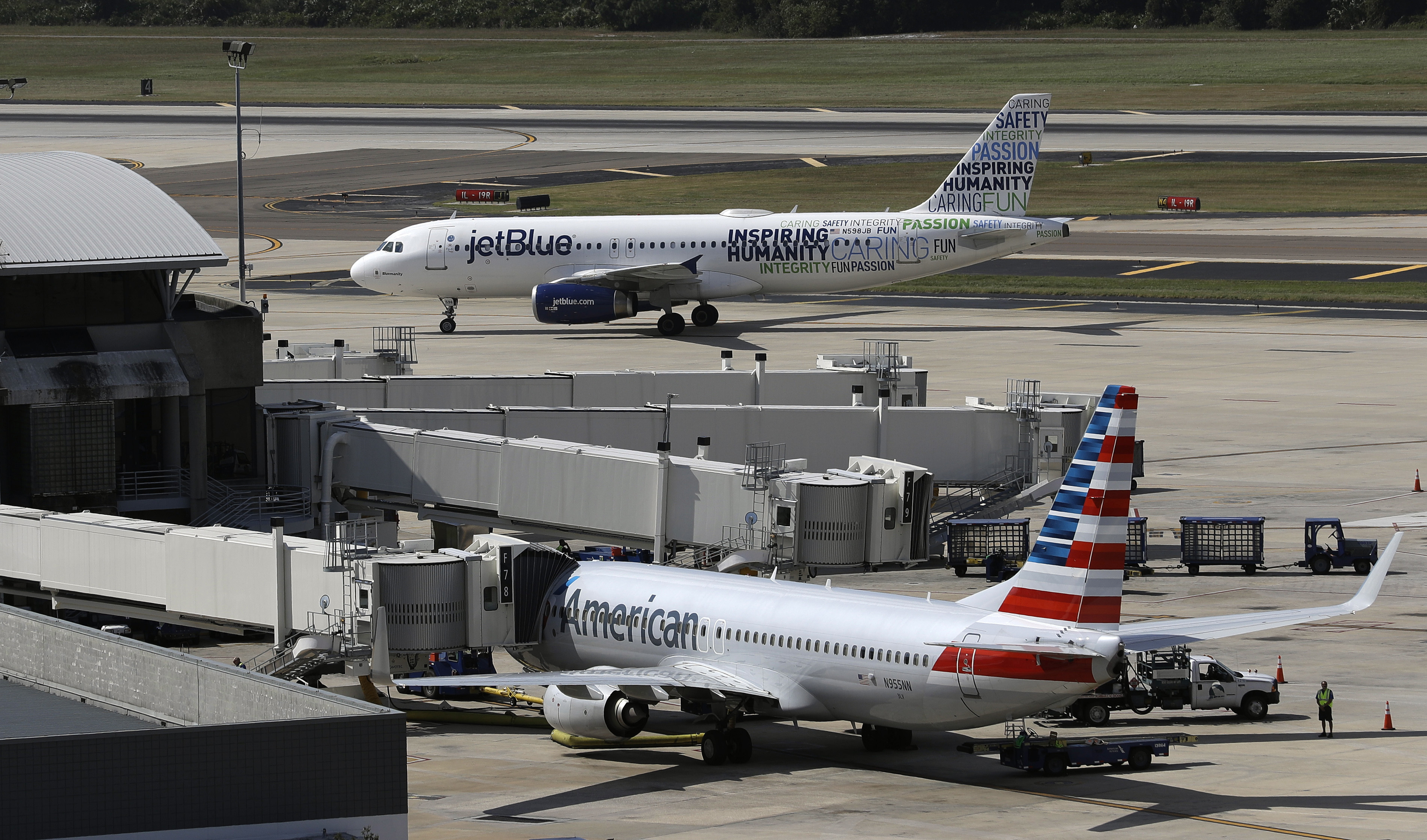 The Justice Department is suing to stop American Airlines and JetBlue from coordinating their flights in the Northeast. Government antitrust lawyers said Tuesday that the deal between the two airlines will reduce competition and lead to higher fares.