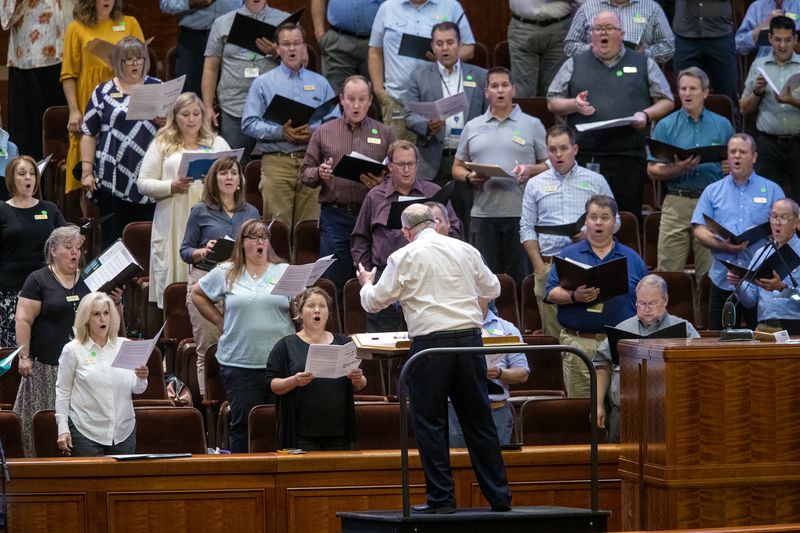 Tabernacle Choir at Temple Square Director Mack Wilberg
gets to work as the choir rehearses at the Conference Center in
Salt Lake City on Tuesday. It was the choir’s first
rehearsal in more than 18 months.