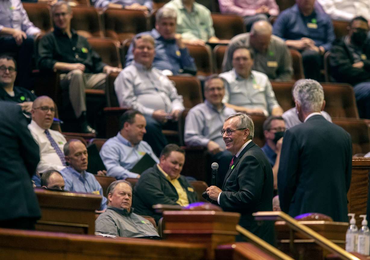 New choir president Michael Leavitt talks to the Tabernacle Choir at Temple Square before they begin their rehearsal at the Conference Center in Salt Lake City on Tuesday.
