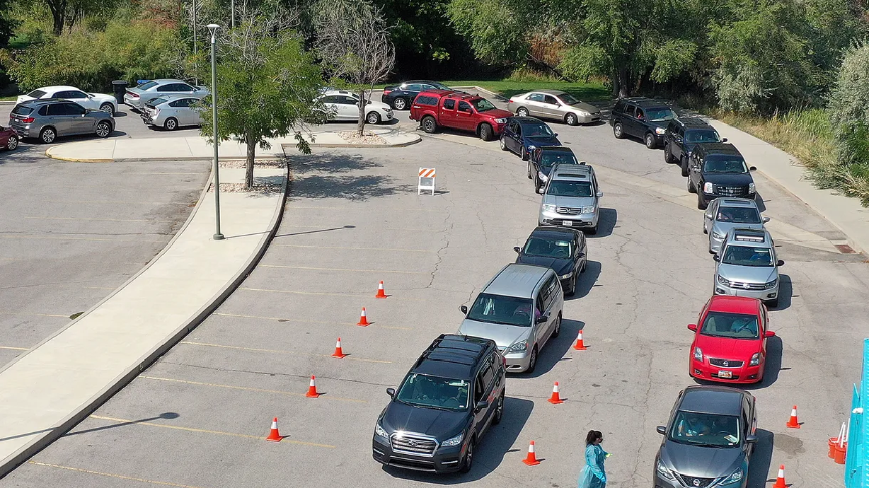 Vehicles line up outside of a COVID-19 testing site at the Mount Olympus Senior Center in Millcreek on Sept. 7.
