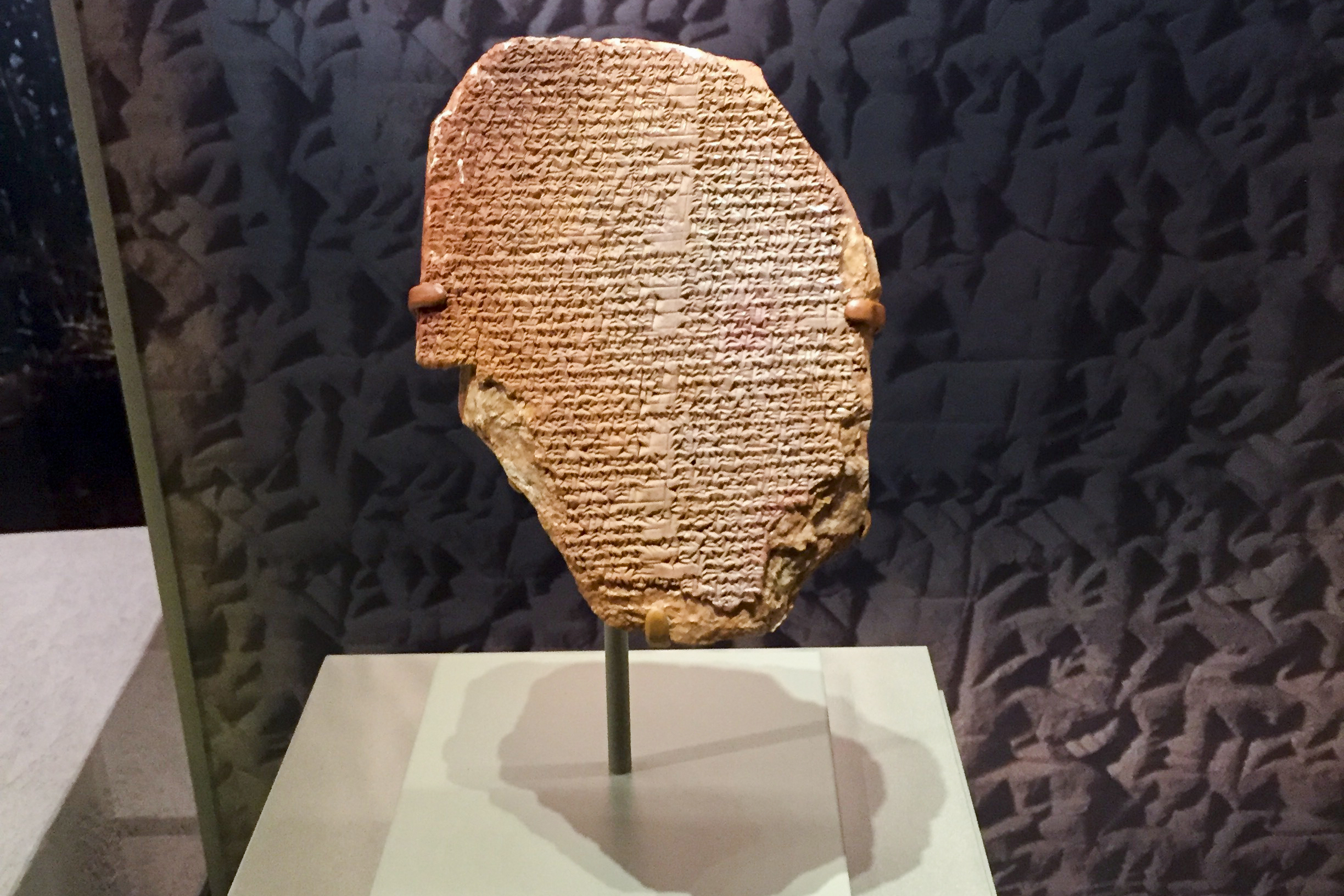 This undated image provided by the U.S. Immigration and Customs Enforcement’s office of public affairs shows a 3,500-year-old artifact, known as the Gilgamesh Dream Tablet. The tablet contains a portion of the Epic of Gilgamesh, considered one of the earliest surviving works of notable literature.