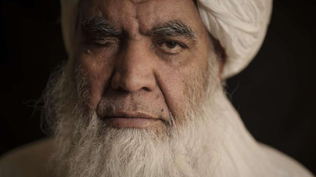 Taliban leader Mullah Nooruddin Turabi poses for a photo in Kabul, Afghanistan, on Wednesday. Mullah Turabi, one of the founders of the Taliban, says the hard-line movement will once again carry out punishments like executions and amputations of hands, though perhaps not in public.