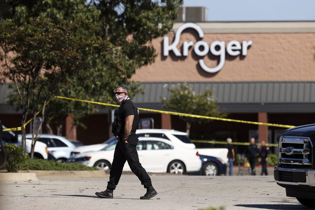 Police respond to the scene of a shooting at a Kroger's grocery store in Collierville, Tenn., on Thursday.