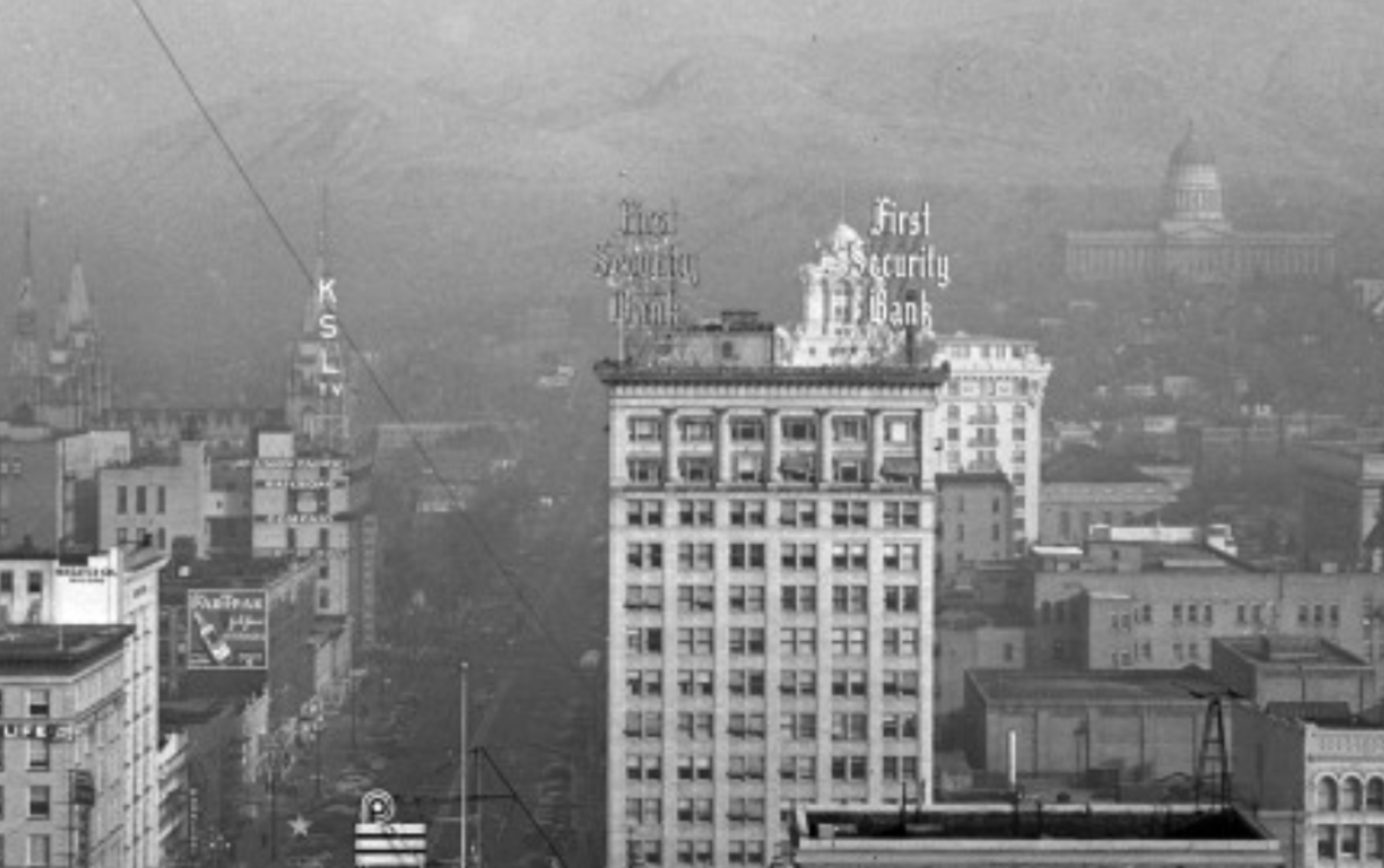 Poor air quality lingers over downtown Salt Lake City on Nov. 28, 1950. A University of Utah researcher says air quality is an issue that's older than the state of Utah itself.