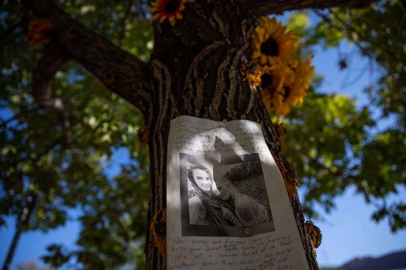 A memorial to Kylen Schulte and Crystal Turner is
pictured outside of the Moonflower Community Cooperative, where
Schulte used to work, in Moab on Friday, Sept. 17.
