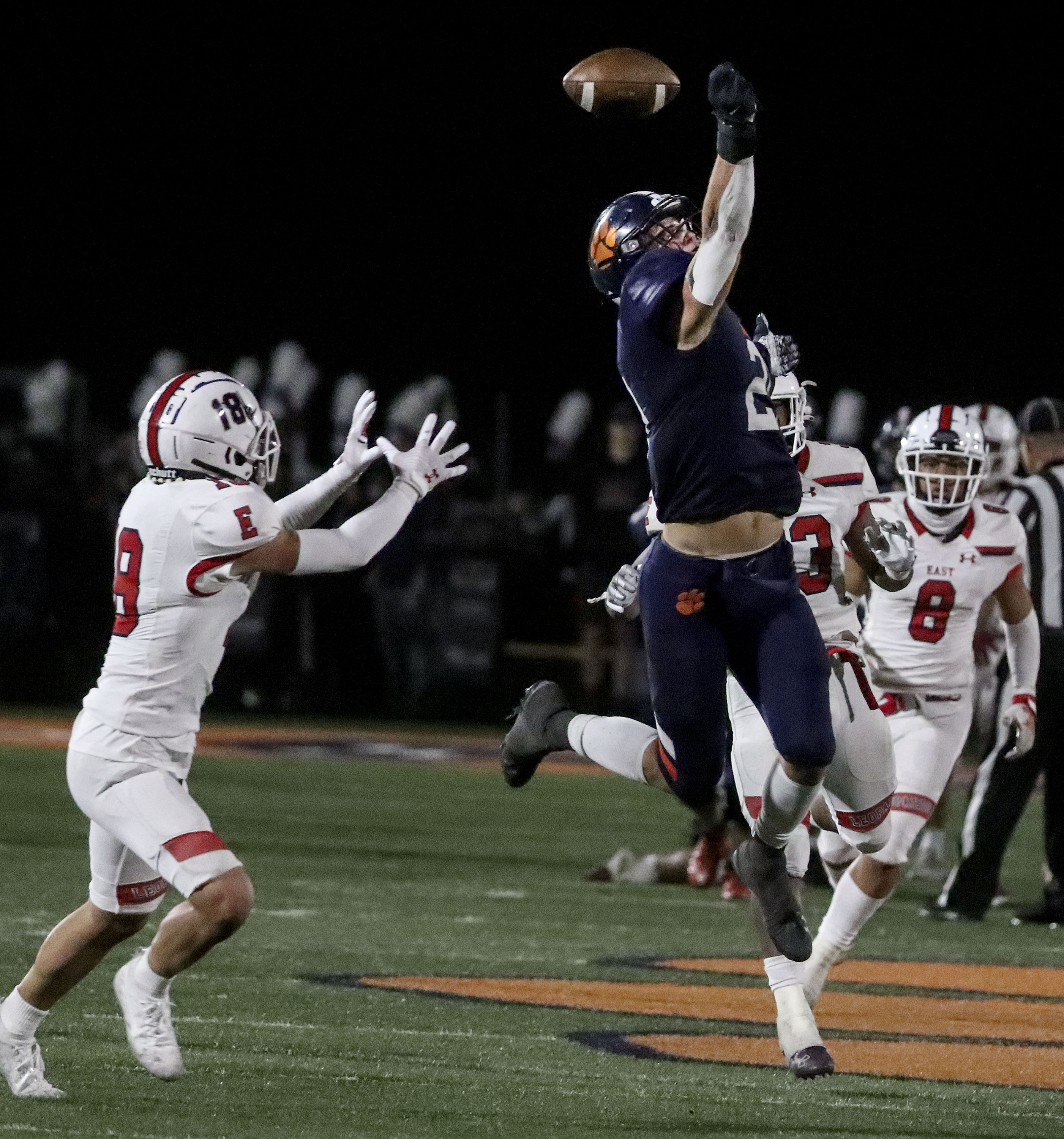 Brighton’s Lander Barton (21) misses a pass as East’s Spencer Black (18) waits to catch it at Brighton High School in Cottonwood Heights on Thursday, Sept. 22, 2021.