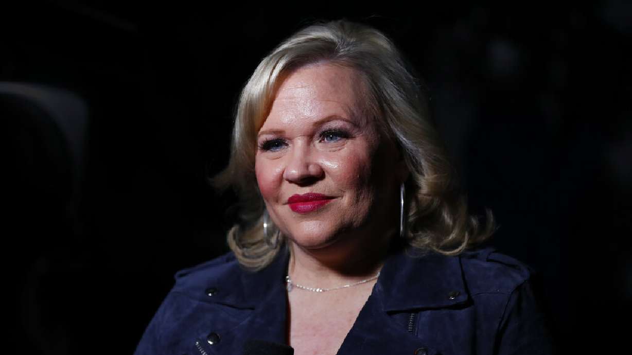 Holly Rowe, a former ESPN sideline reporter, is shown in the first half of an NCAA college basketball game against Maryland in East Lansing, Michigan, Feb. 15, 2020. Rowe, a University of Utah graduate and longtime ESPN reporter, is joining the Utah Jazz's broadcast team, the team announced Friday.