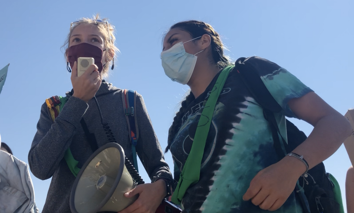 Natalie Roberts, a freshman at West High School, left, and Raquel Juarez, a Fridays For Future organizer, right, lead a chant during the Global Climate Strike outside of the Utah Capitol Friday.