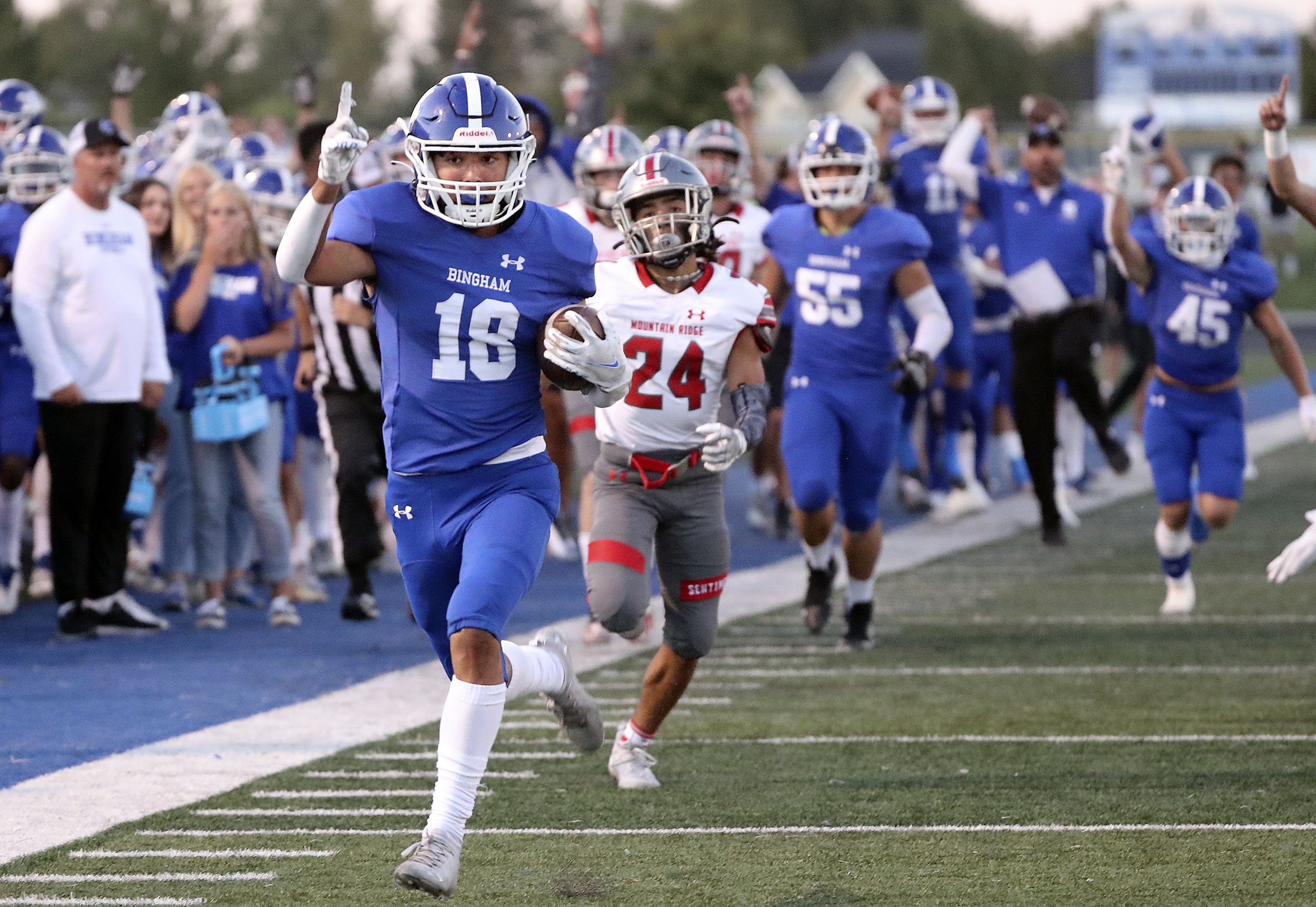 Bingham’s Maddax Peck runs for a touchdown in a high school football game against Mountain Ridge at Bingham High School in South Jordan on Friday, Sept. 24, 2021.