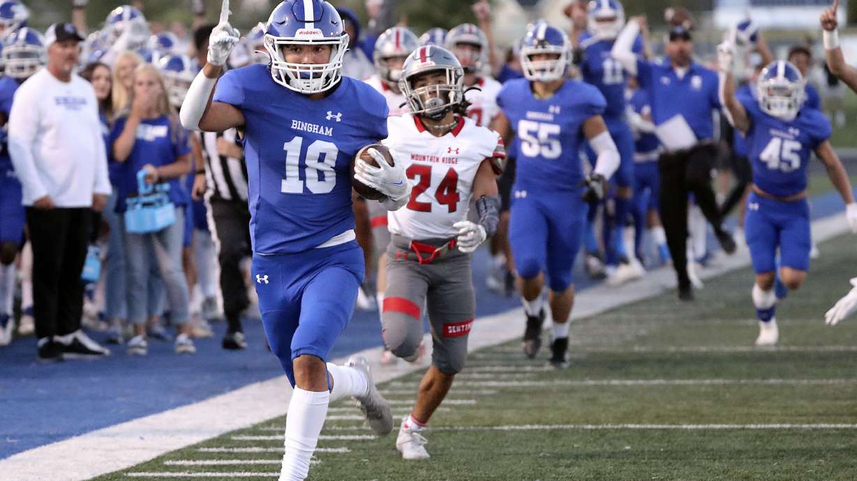 Bingham’s Maddax Peck runs for a touchdown in a high school football game against Mountain Ridge at Bingham High School in South Jordan on Friday, Sept. 24, 2021.