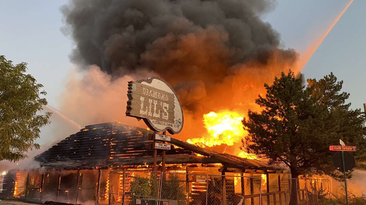 Salt Lake City firefighters respond to a structure fire at an old Diamond Lil's restaurant, 1528 W. North Temple, early Saturday. The building was vacant at the time of the fire.