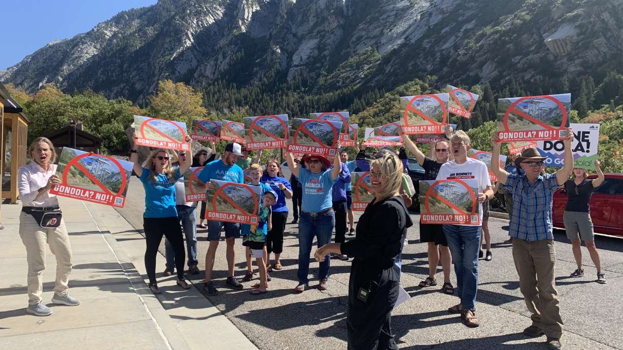 A group of community members protest the suggestion of an 8-mile gondola in Little Cottonwood Canyon on Saturday.