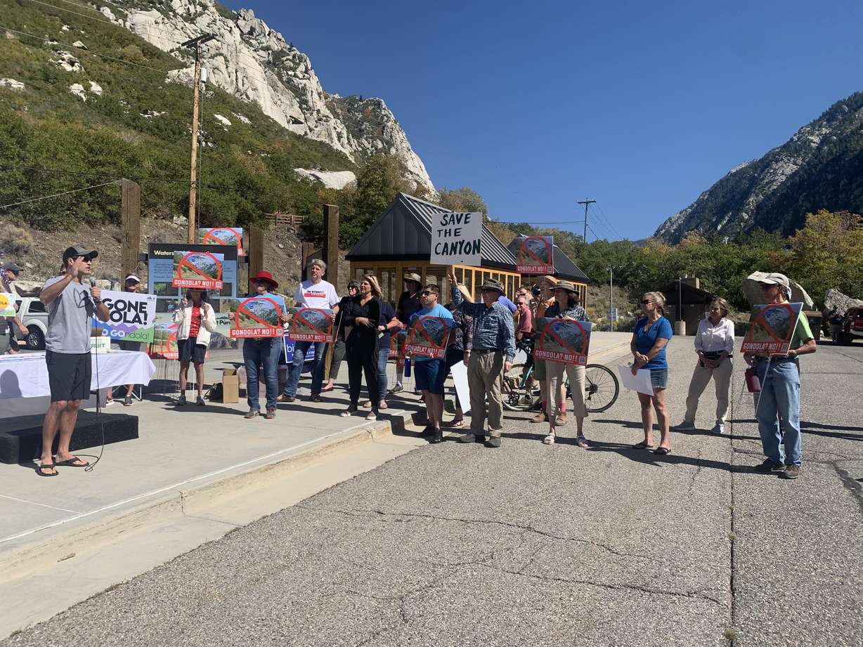 A group of community members protest the suggestion of an 8-mile gondola in Little Cottonwood Canyon on Saturday.