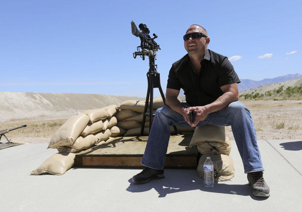 TacGas CEO Jim Staley talks with his crew during a promotional video and photo shoot for a TacGas client at Special Weapons Test Center near Grantsville on May 12.