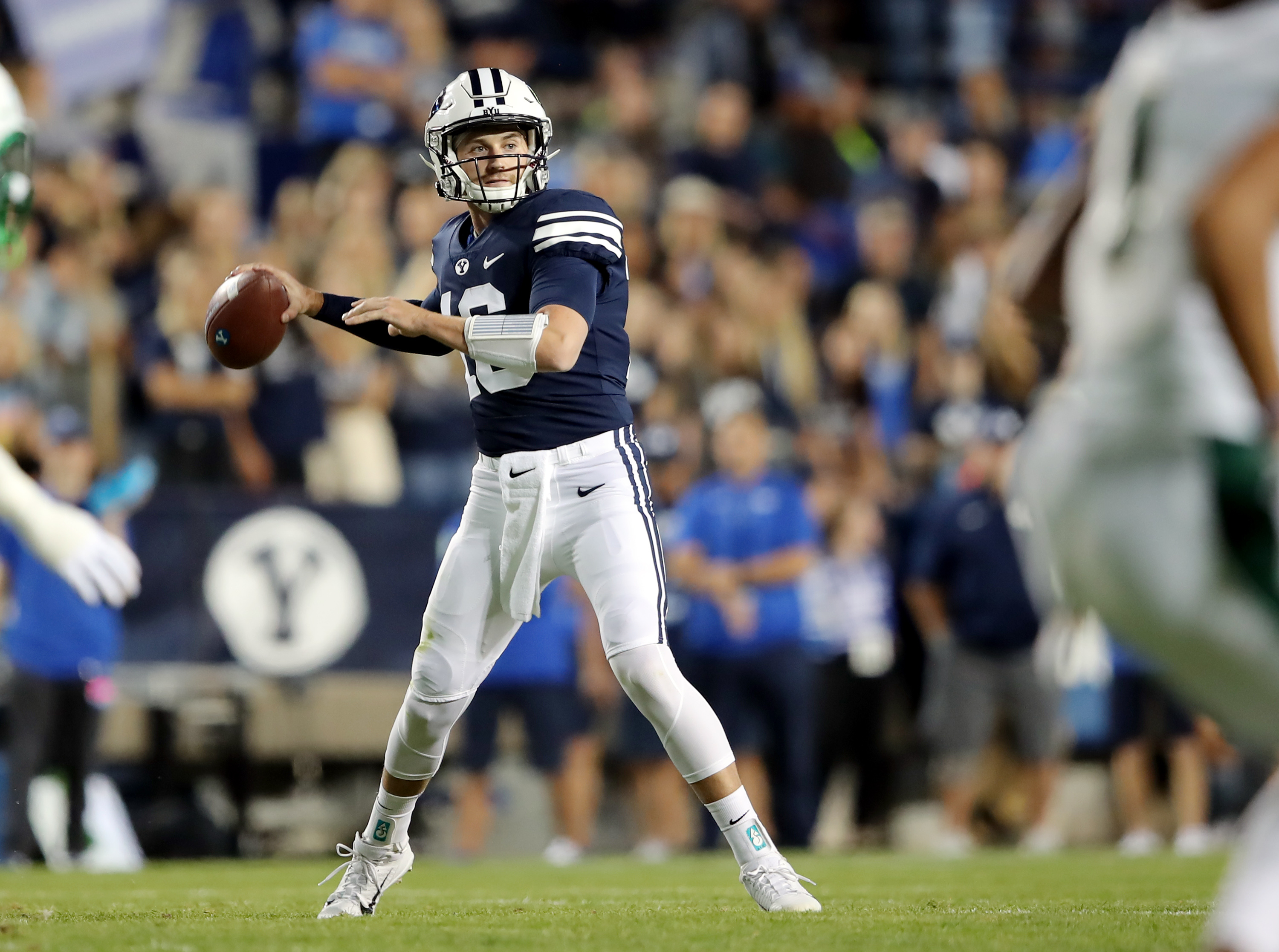 BYU quarterback Baylor Romney (16) looks to make a throw as BYU and USF play a college football game at LaVell Edwards Stadium in Provo on Saturday, Sept. 25, 2021.
