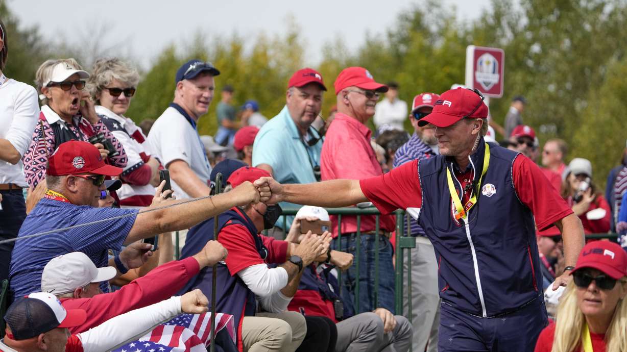 Team USA captain Steve Stricker greets fans on the second hole during a Ryder Cup singles match at the Whistling Straits Golf Course Sunday, Sept. 26, 2021, in Sheboygan, Wis.
