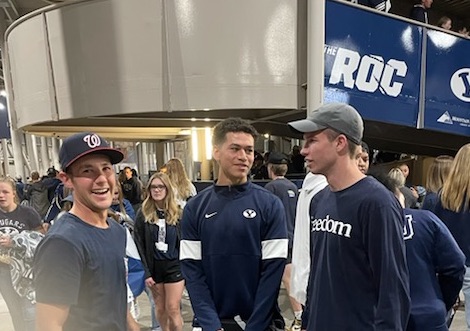 Timpview junior and BYU recruit JJ Tuha, middle, takes a photo with BYU fans after the Cougars' win over South Florida — when Tuha was mistaken for quarterback Jaren Hall during the ESPN2 broadcast, which quickly went viral on social media.